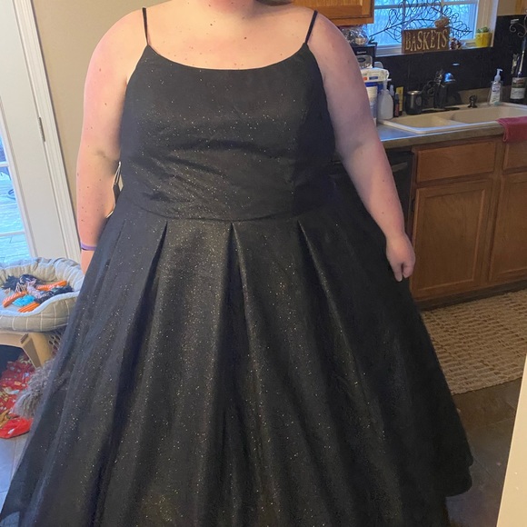 Brand new Black ball gown with a beautiful shimmer. Very pretty dress. - Picture 1 of 1